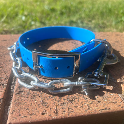 Blue waterproof PVC working dog collar with chain shackled to the High Profile D-ring